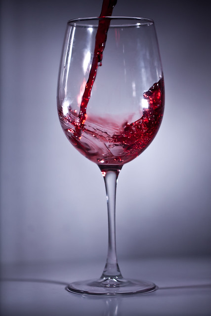 red wine being poured into glass
