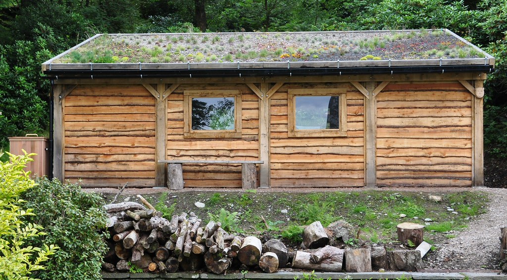 Green Oak and Larch clad shed Green Oak shed with green 