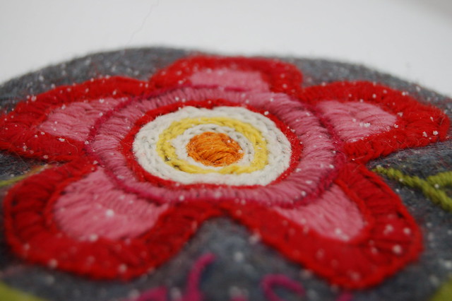 Red and pink wool flower