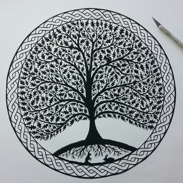 Oak tree papercut with Celtic braid border