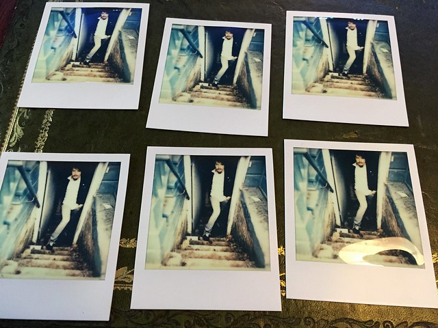 6 Polaroids, each from a slightly different perspective