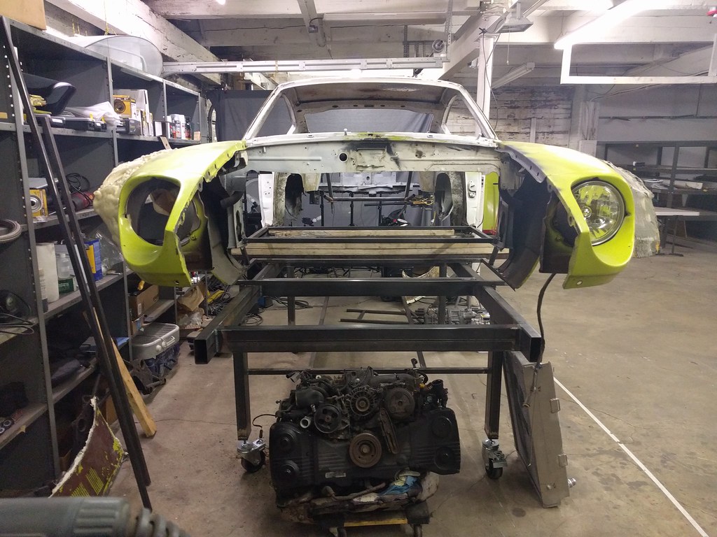 Datsun on the chassis table from the front
