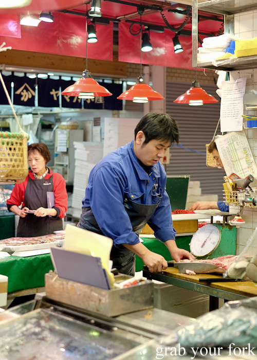 Fishmonger at Omicho Market, Kanazawa, Japan