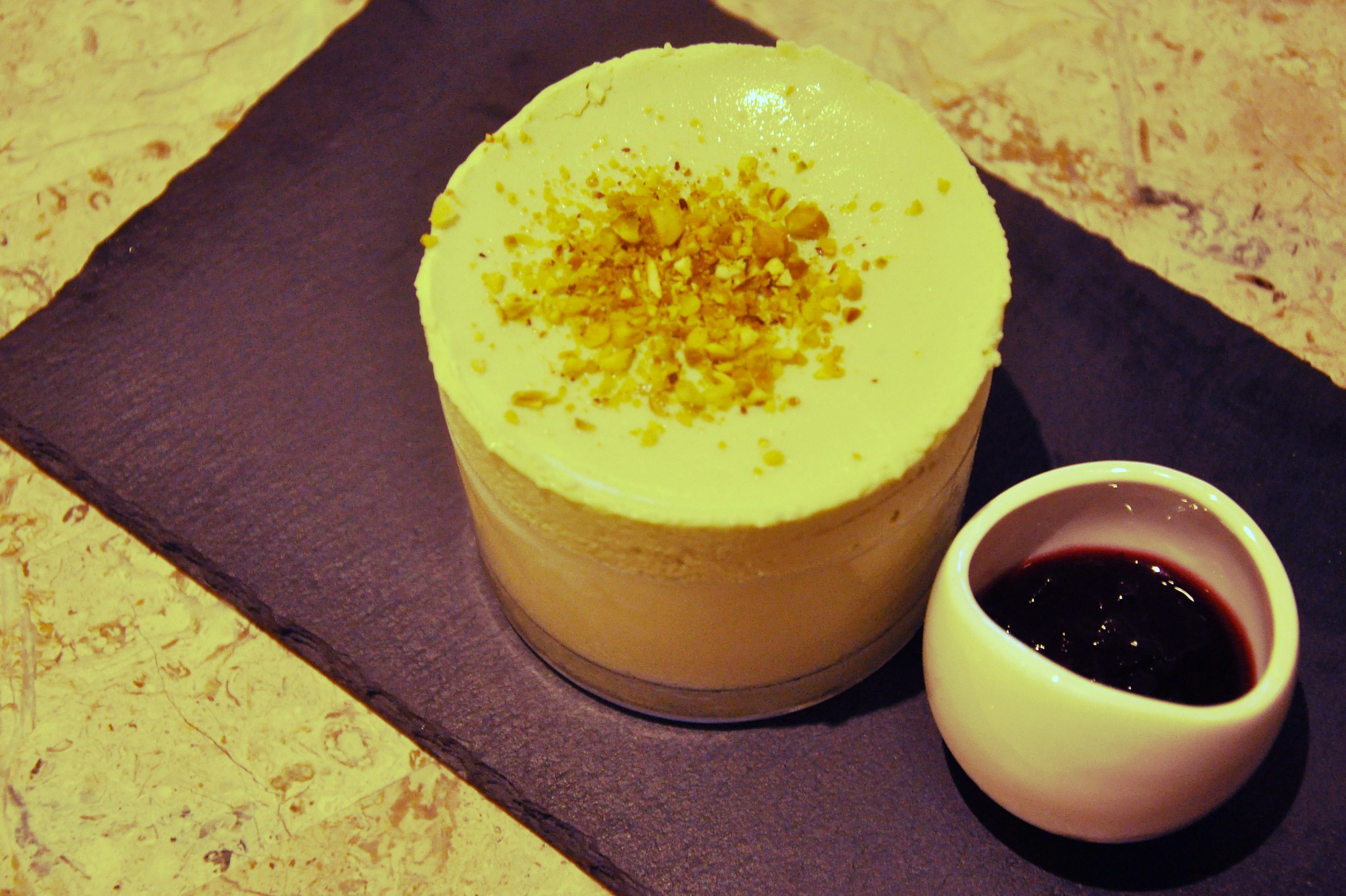 French frozen pistachio souffle with cherry griotine confiture