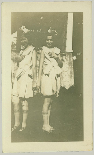 two girls in costumes