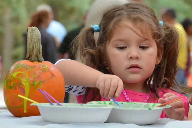 Pumpkin painting is a popular activity at a fall festival at Virginia State Parks