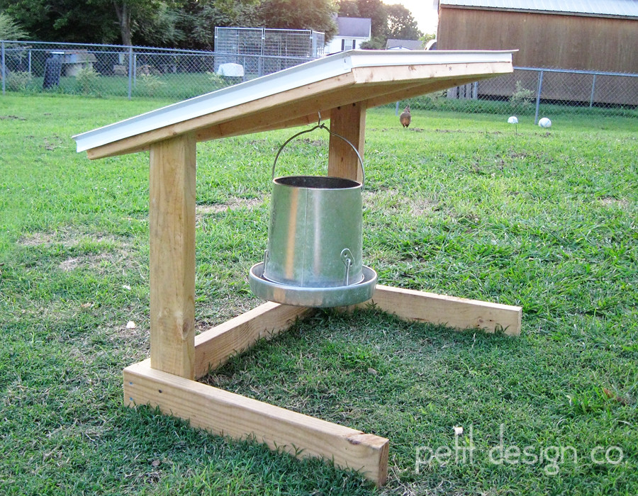 Chicken feeder hanger | My husband built this to keep the ...