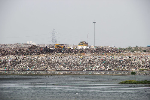 The Perungudi solid waste dump yard slowly eats into the marshland.