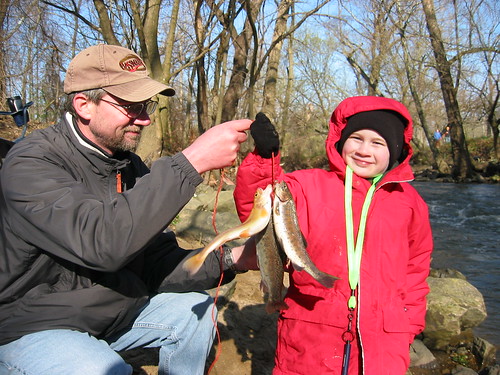 Photo of young angler with trout