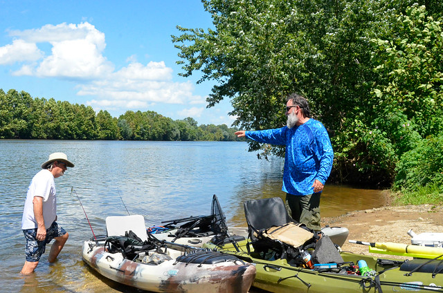 Kayak fisherman at Dixon Landing takeout, James River State Park Va