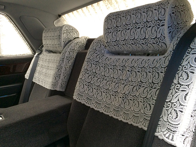 It's not a true Japanese luxury vehicle without seat doilies. 