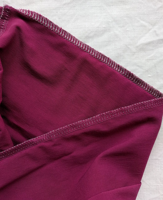 An image of the inside of the Elle pant. Overlocker thread is grey and purple.