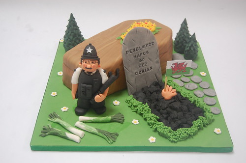 Quite an unusual request- a cake for a Welsh undertaker who used to be a policeman! The Undertaker/Policeman Cake - from £70.