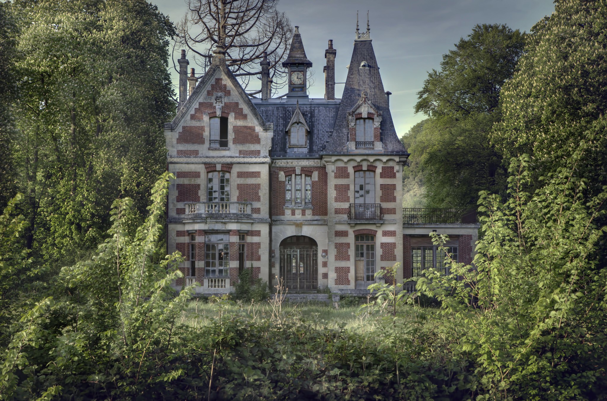 This amazing abandoned mansion in the woods. Sitting