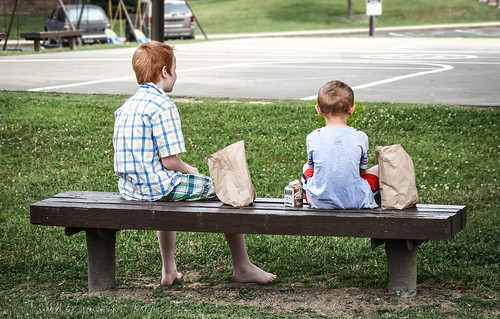 Two young boys enjoying lunch near their home in Knox County, Ky