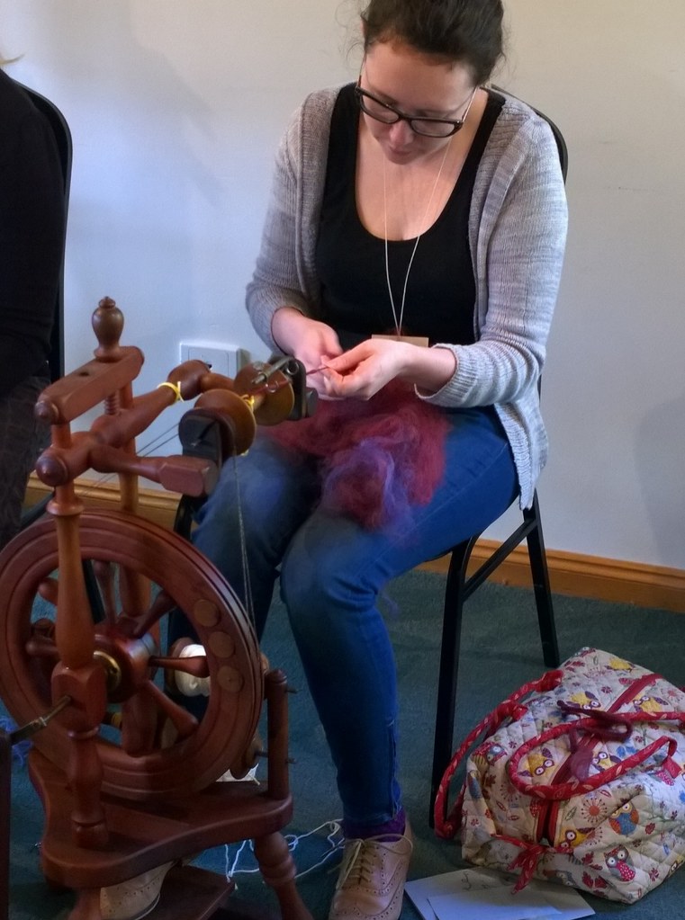 hard at work spinning on a wheel, that look of concentration