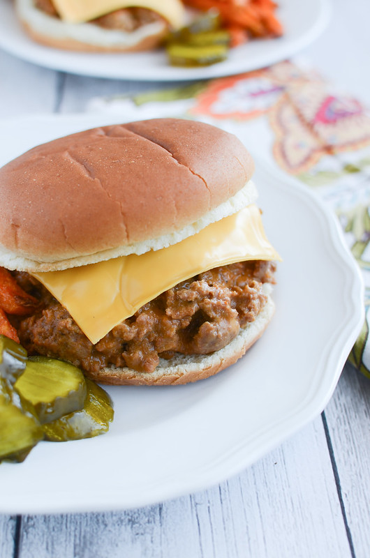 Crockpot Cheeseburgers - sloppy joe style cheeseburgers cooked in the slow cooker. Easy weeknight dinner the whole family will love!