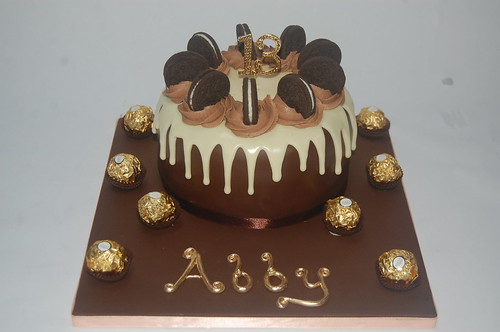 My daughter's 13th Birthday Cake - a bit of gorgeous glamour when they've outgrown the novelty characters! The Oreo and Rocher Drip Cake - from £70.