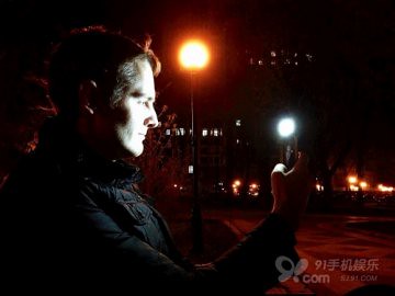 Camera person Ukraine iblazr mobile phone LED flash