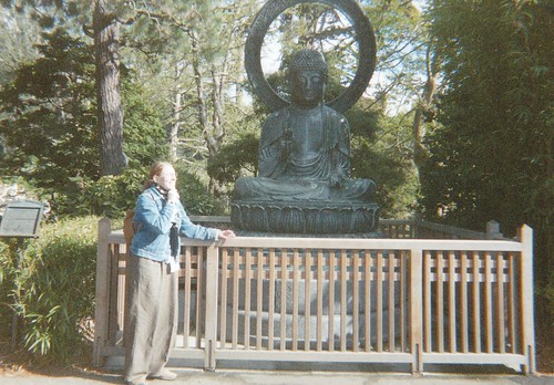 Posing with the Buddha Statue at Golden Gate Park in San Francisco