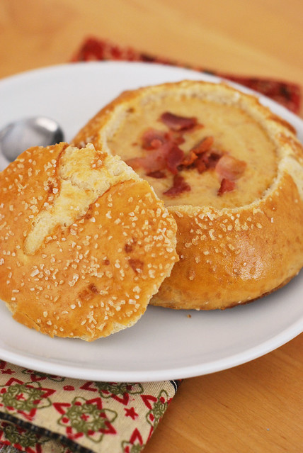 Cheddar Ale Soup in Soft Pretzel Bowls - homemade pretzel bowls filled with cheesy bacon beer soup! The best part is eating the bowl once the soup is all gone!