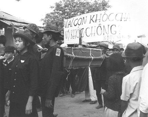 Mass funeral for 136 victims of Communist Tet offensive (1968) in Hue.