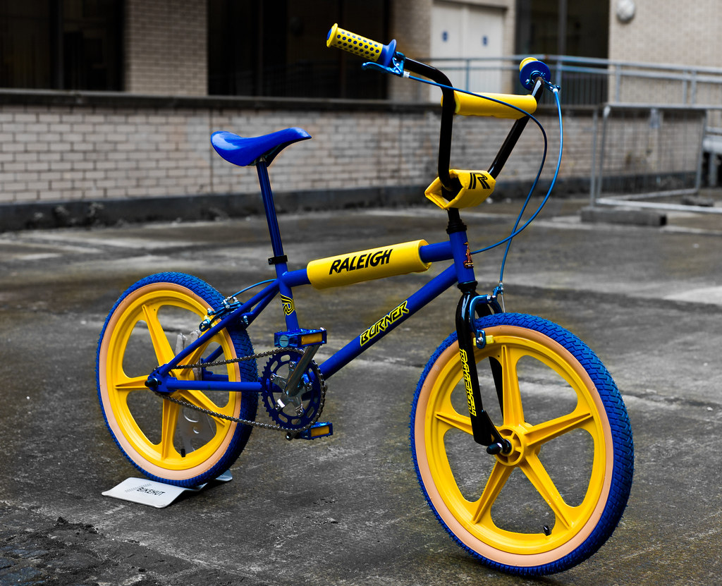 blue and yellow bmx bike