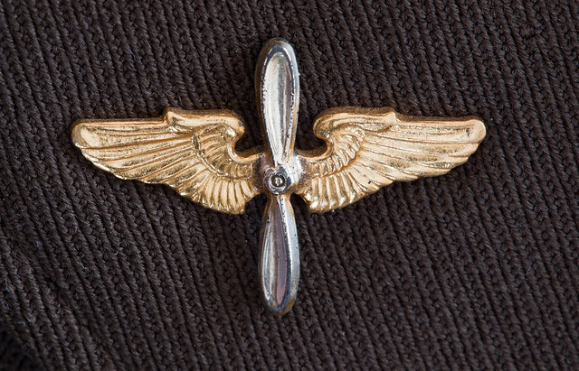 1940s World War II gold insignia pin (airplane propeller and wings