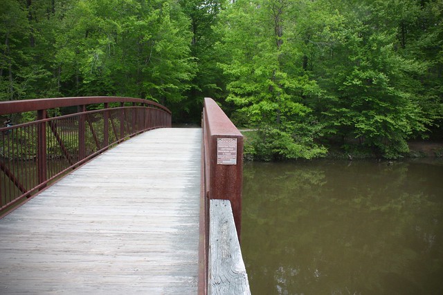 Fun places to explore on your hike at Pocahontas State Park like this iron foot-bridge - Bridge crossing over Swift Creek to the Forest Exploration Trail
