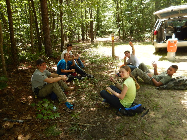 Volunteers relax after a workday on a trail at Pocahontas State Park, Virginia