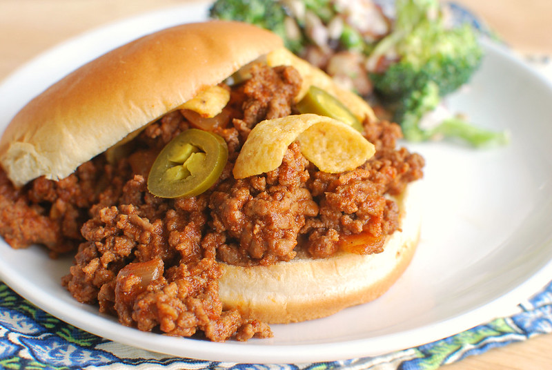 Smoky Tex-Mex Sloppy Joes - smoky and spicy sloppy joes topped with fritos and pickled jalapenos! Easy 30 minute meal the whole family will love!