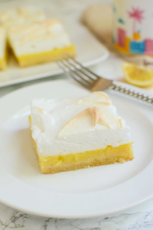 Lemon Meringue Pie Bars - buttery shortbread crust with tart lemon filling, topped with fluffy toasted meringue! 
