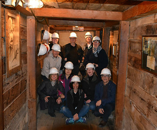 A group of participants visiting in a silver mine in Virginia City