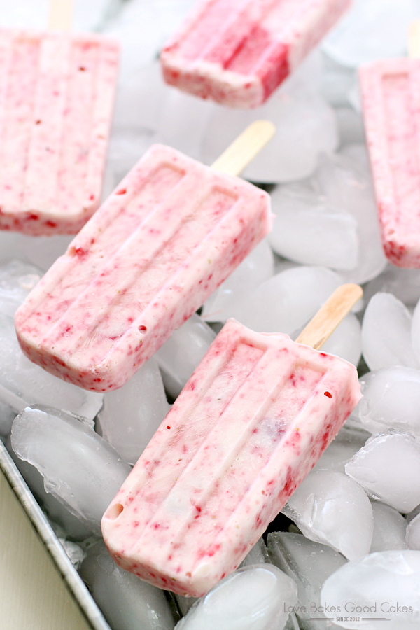 Strawberry-Yogurt Popsicles over ice.