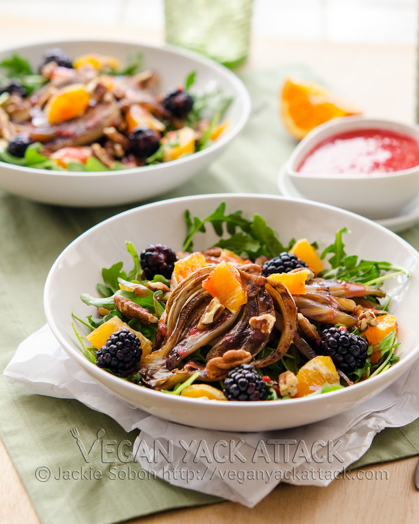 This Fruity Roasted Fennel Salad is perfect for spring! Fresh fruit, roasted balsamic fennel, peppery arugula and a superb strawberry vinaigrette.