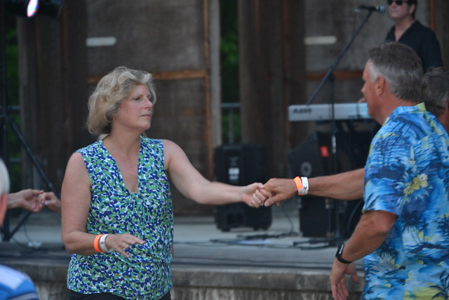 Concert goers enjoying the dancing to the beat at the Amphitheater at Pocahontas State Park, Virginia
