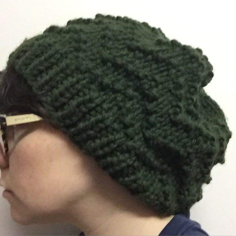 chunky knit beanie in forest green, featuring a chevron patterning in the body