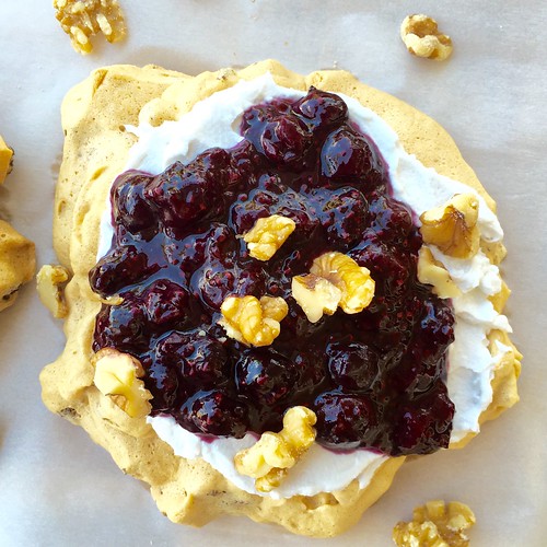 Healthy Walnut Pavlova with Blueberry Sauce. It's sugar-free, gluten-free, and naturally high in protein!