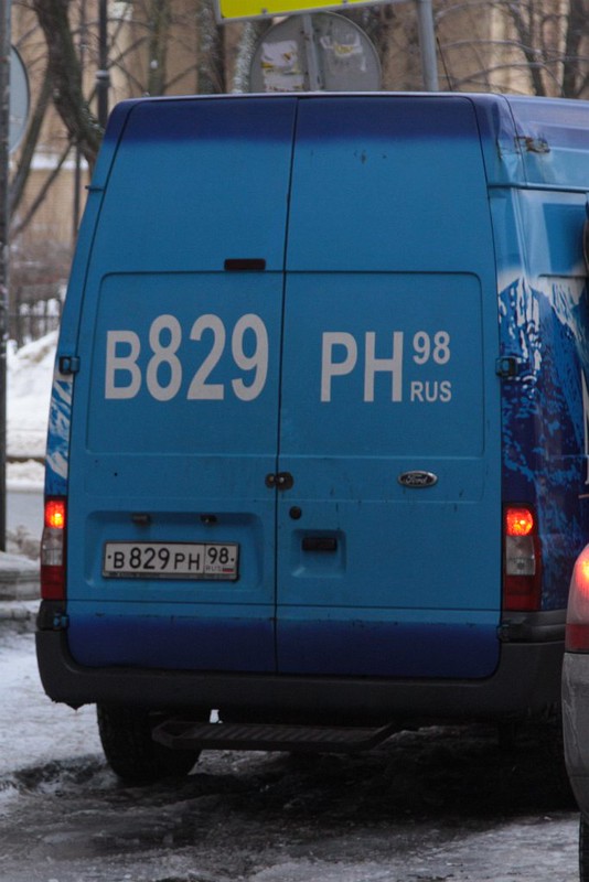 Russian vans and trucks often have their registration plate repeated in big letters on the rear of the vehicle for easier identification