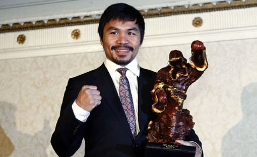 Manny Pacquiao With His Trophy