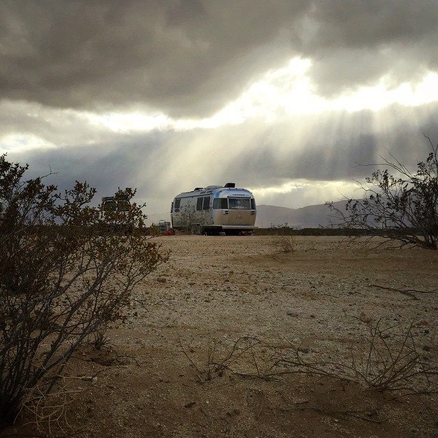 Last night the clouds rolled in and started to rain shortly after night fall. The overcast skies helped to insulate the desert air and kept the temperatures above freezing down on the desert floor. We never did get the snow as the forecast promised but we