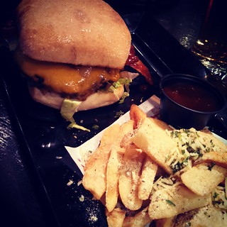 Yumo! Southern Charm #burger and garlic herb #fries First time at #RedRobin and we'll definitely be back! #foodstagram