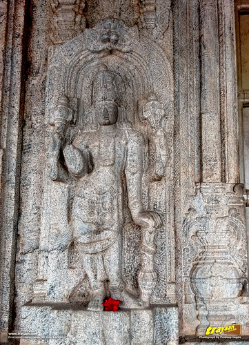 Relief sculptures on either side of the doors of the Chaturmukha Basadi in Karkala, the Tribhuvana Tilaka Jina Chaityalaya or Ratnatraya dhama, in Karkala, Udupi district, Karnataka, India