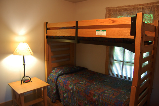2 sets of bunks beds and one queen bed master bedroom sleep up to six at cabin 1 at Natural Tunnel State Park, Va