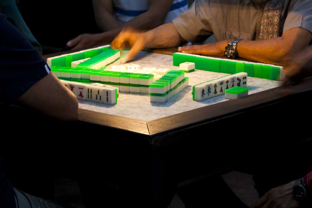 Playing Mahjong in Chinese Club in Tiretta Bazar, Kolkata, India