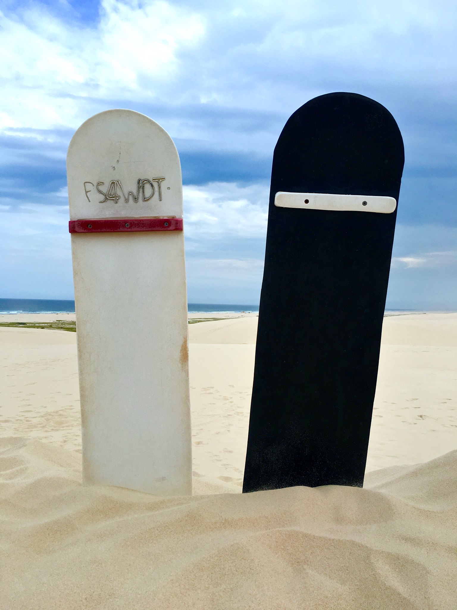 Black & white sand boarding boards