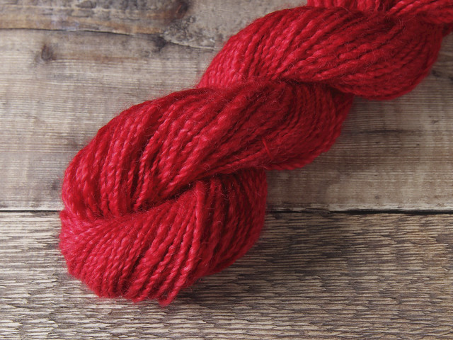 Hand spun, hand dyed pure British Wensleydale wool aran yarn, bright red