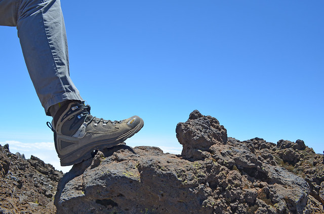 Boots on volcanic rock