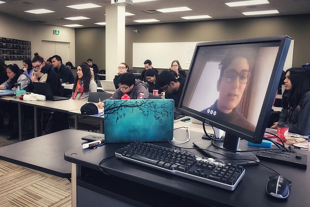 Lia Milito guest lecturing the class via videoconference