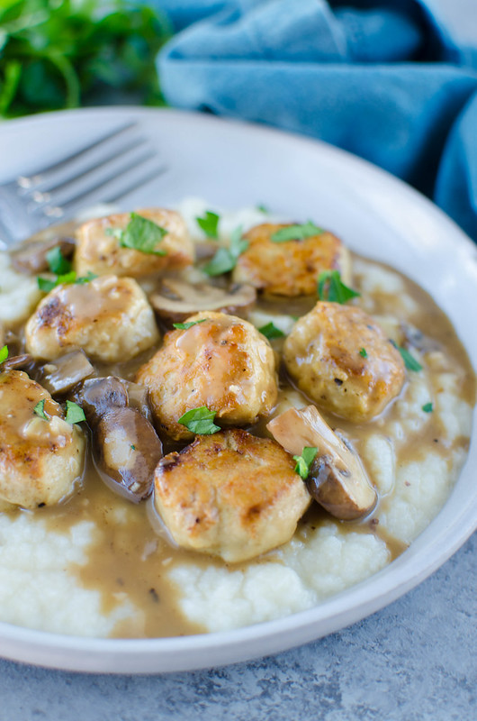 Paleo Chicken Marsala Meatballs - paleo meatballs in a delicious creamy mushroom sauce. Serve over mashed cauliflower for the perfect paleo comfort food!